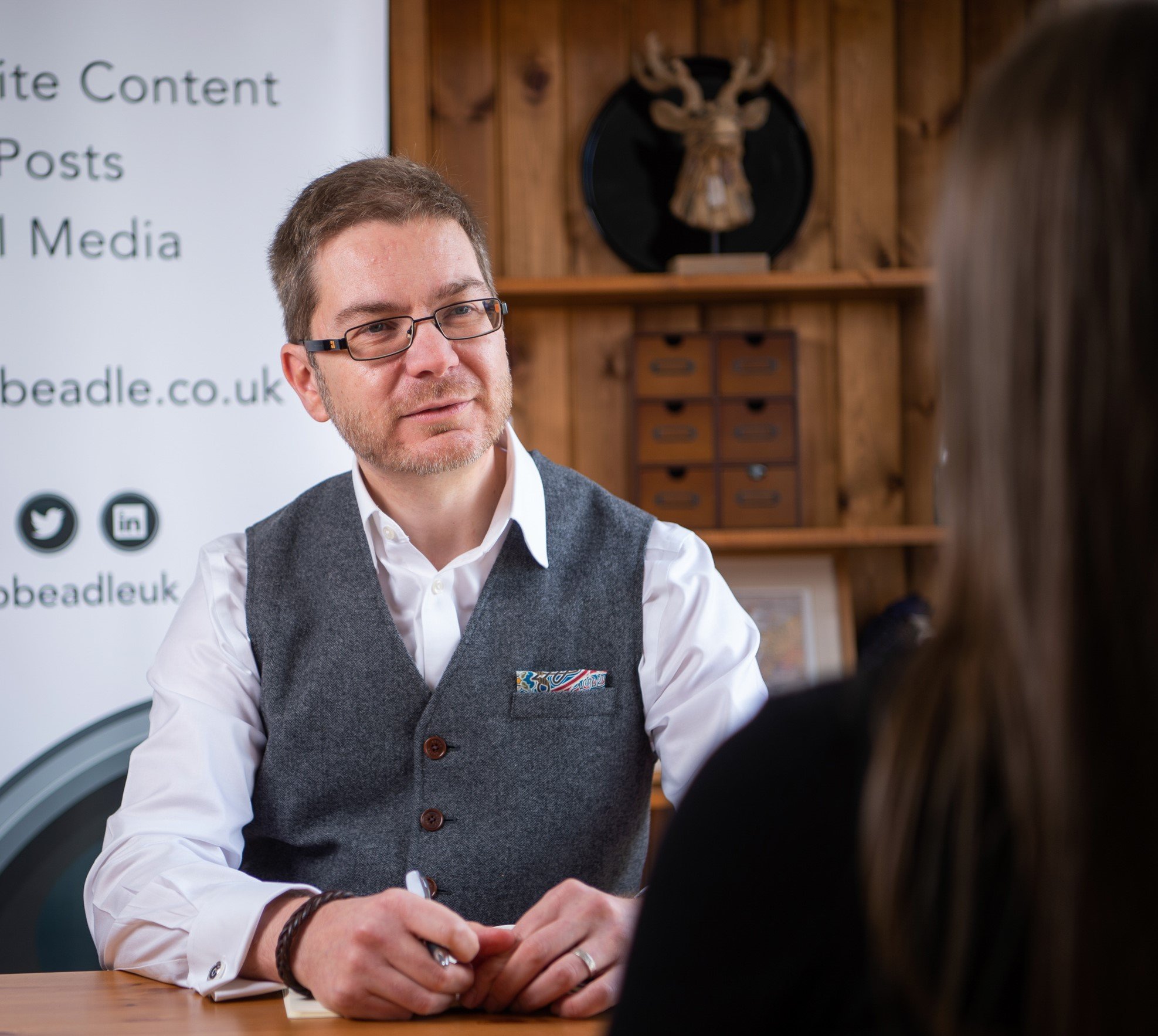 Rob Beadle talking to a client
